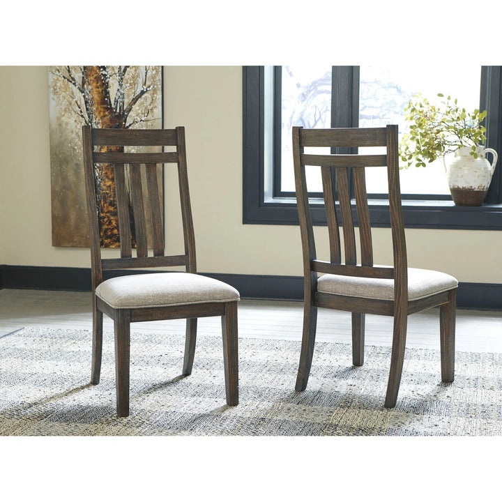 Ashley D813/55T/55B/01(4)/02(2) Wyndahl - Rustic Brown - 8 Pc. - RECT DRM EXT Table, 4 UPH Side Chairs & 2 UPH Side Chairs