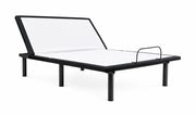 Adjustable platform bed frame with a black metal frame and white mattress, shown on a solid white background.