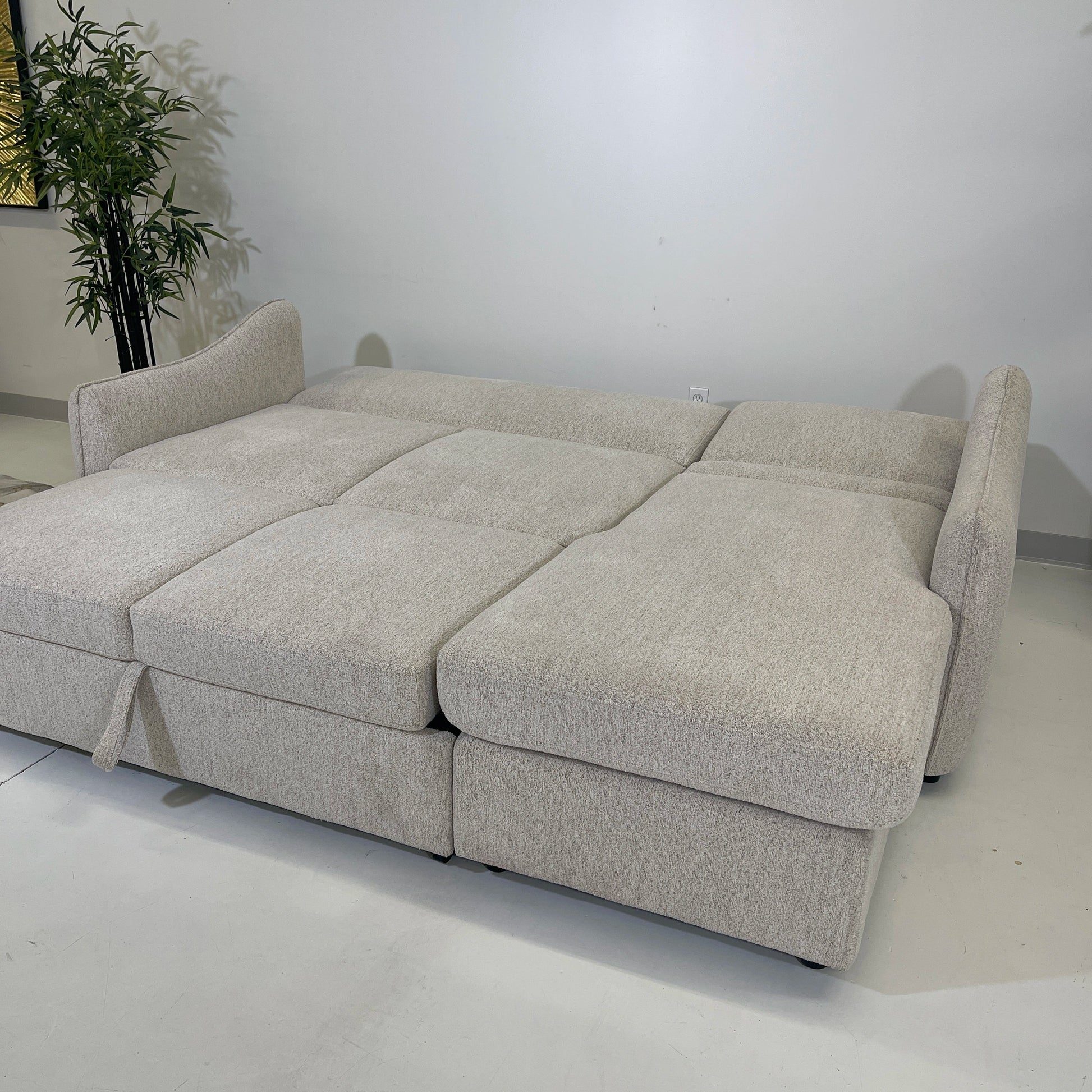 Media sleeper sectional with backs down, large lounge area