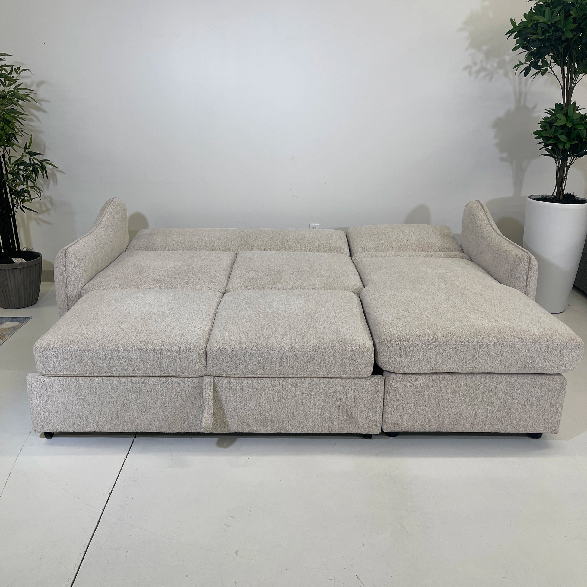 Media Sleeper sectional with backs down front shot, Large Lounge Surface
