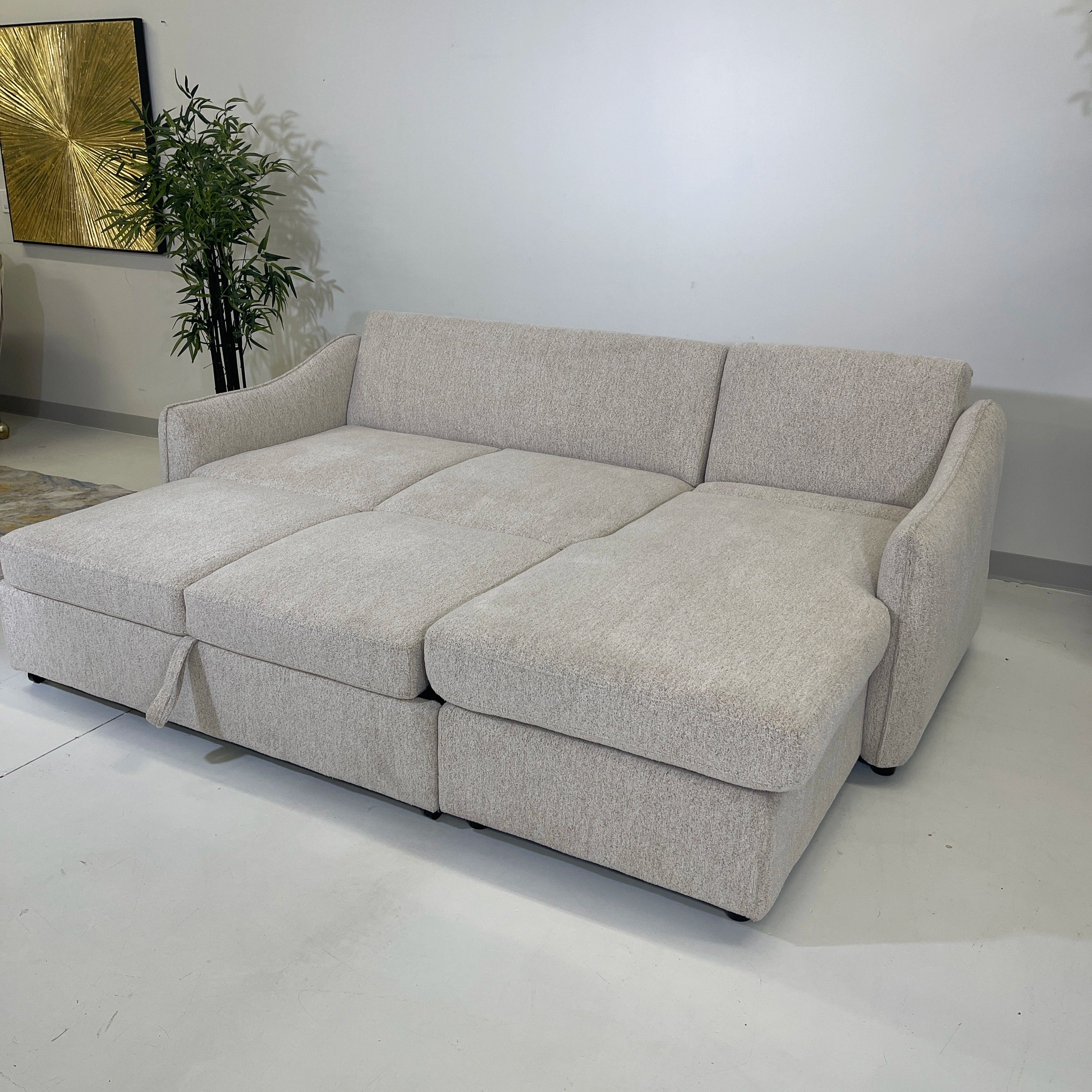 Media sleeper with no pillows, lounge area, sofa bed, pull out, sleeper detail shot